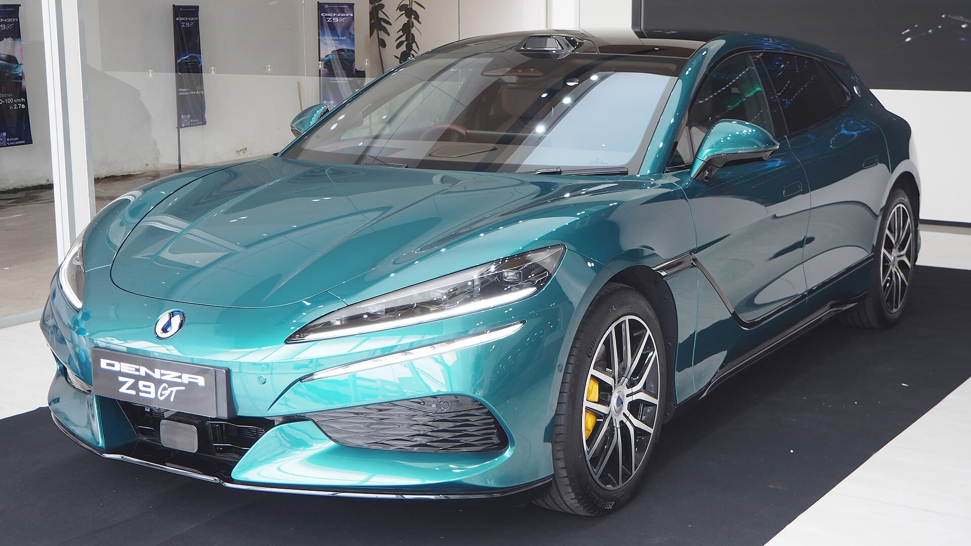 2026 Denza Z9 GT Performance AWD photographed at a Denza dealer in Khon Kaen, Thailand — the live GetEVCar Denza model
