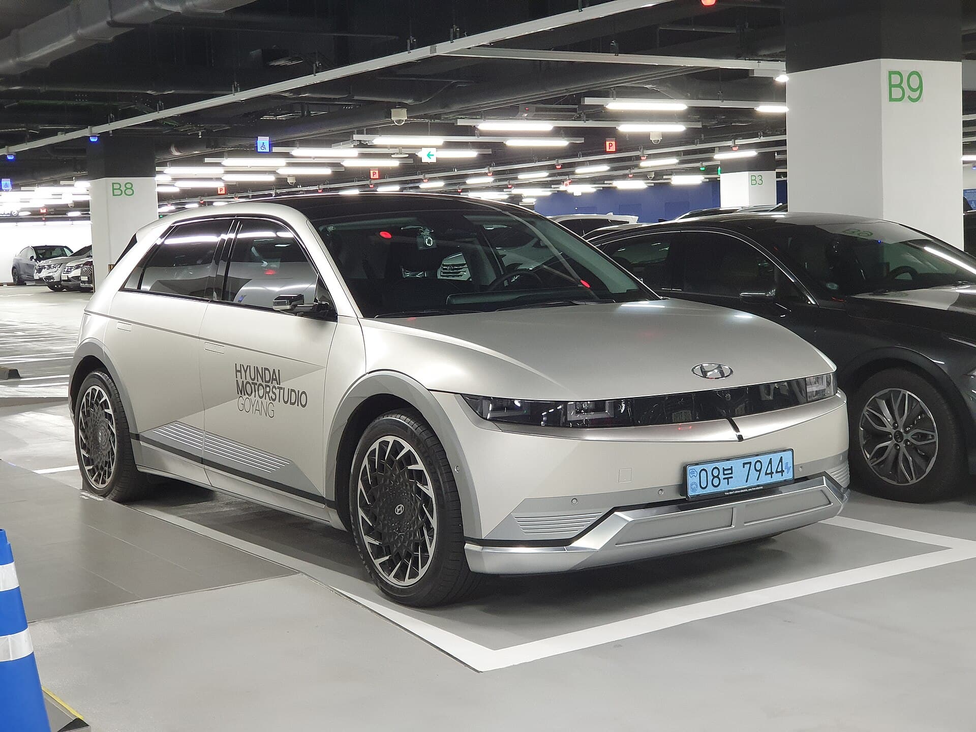 Gravity Gold Matte Hyundai Ioniq 5 electric SUV, three-quarter front view