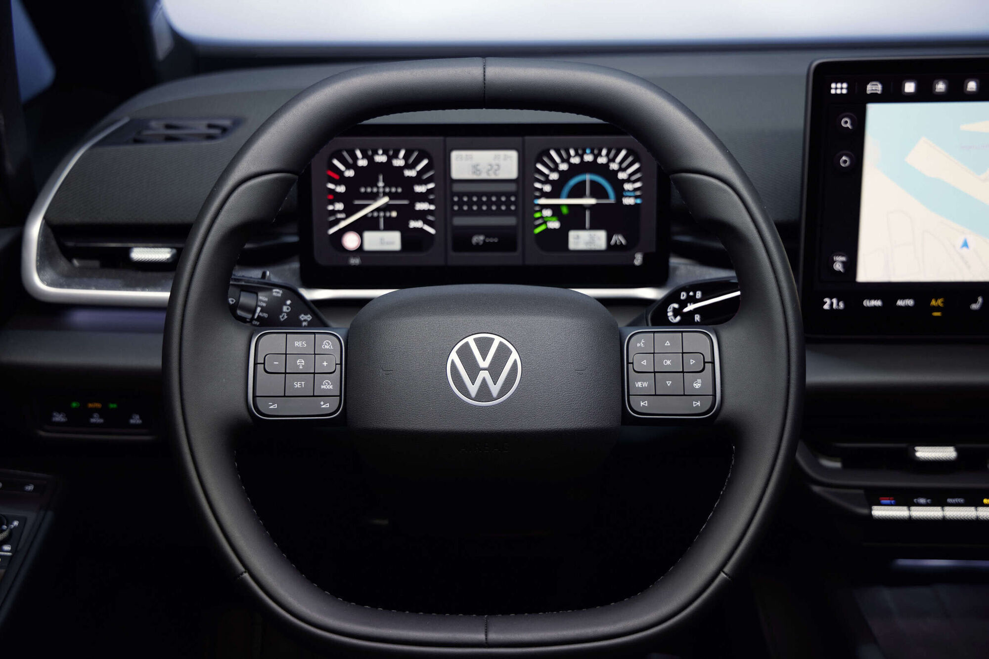 Volkswagen ID.3 Neo driver display, steering wheel, and physical cabin controls — manufacturer press photo