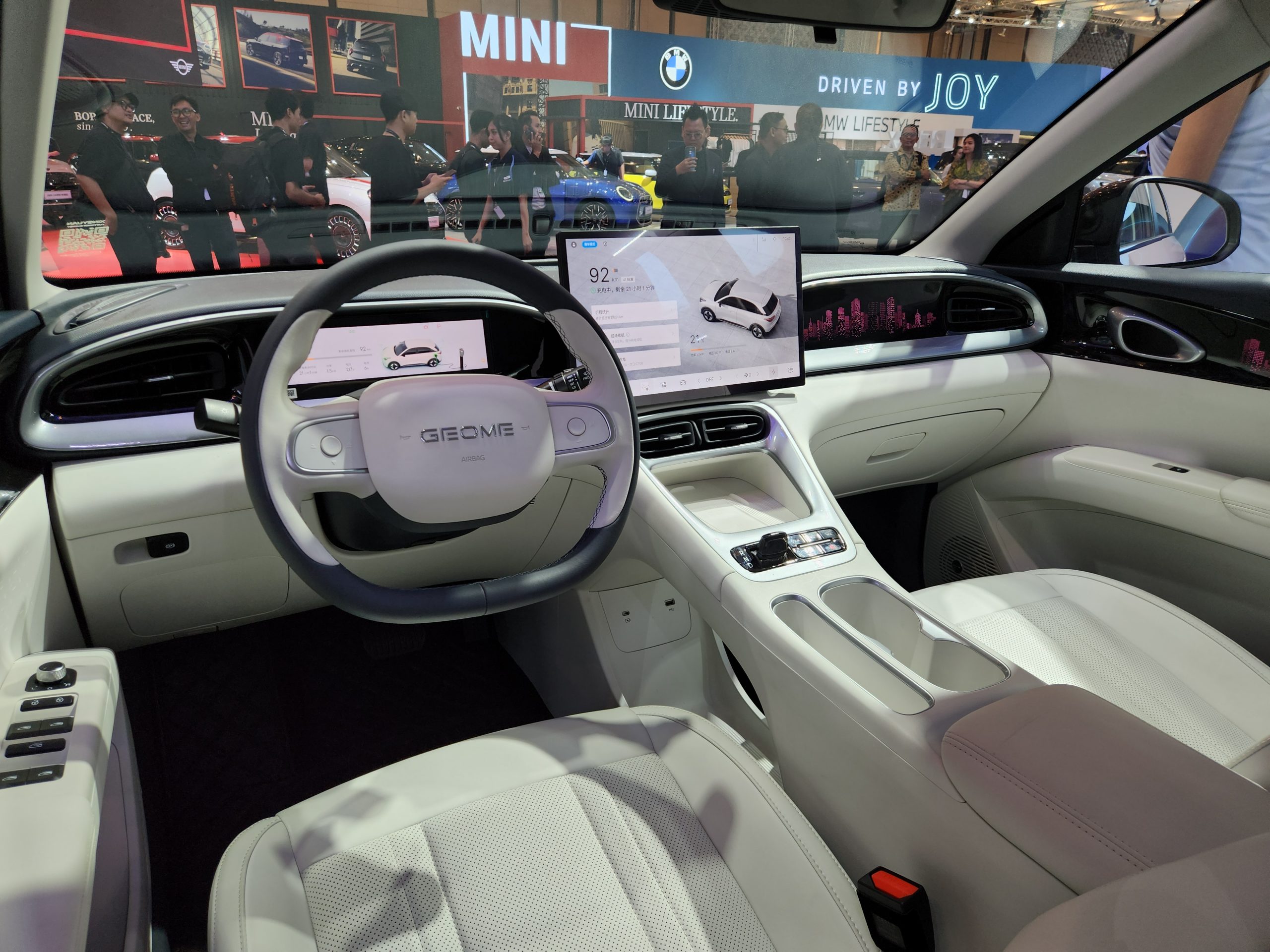 Interior of a 2025 Geely Xingyuan compact EV, showing the wide centre touchscreen used on the EX2.