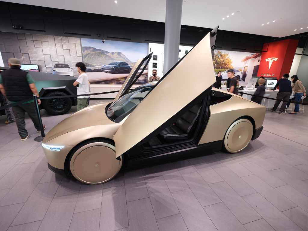 Tesla Cybercab three-quarter view at Santana Row, no conventional grille