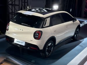 AION UT electric hatchback parked outdoors, front three-quarter view