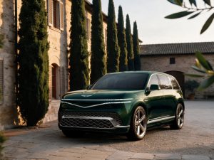 Genesis GV90 electric flagship SUV parked outdoors, front three-quarter view