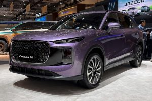 Lepas L8 PHEV shown at a regional launch event, sharing its platform and powertrain with UK-spec cars