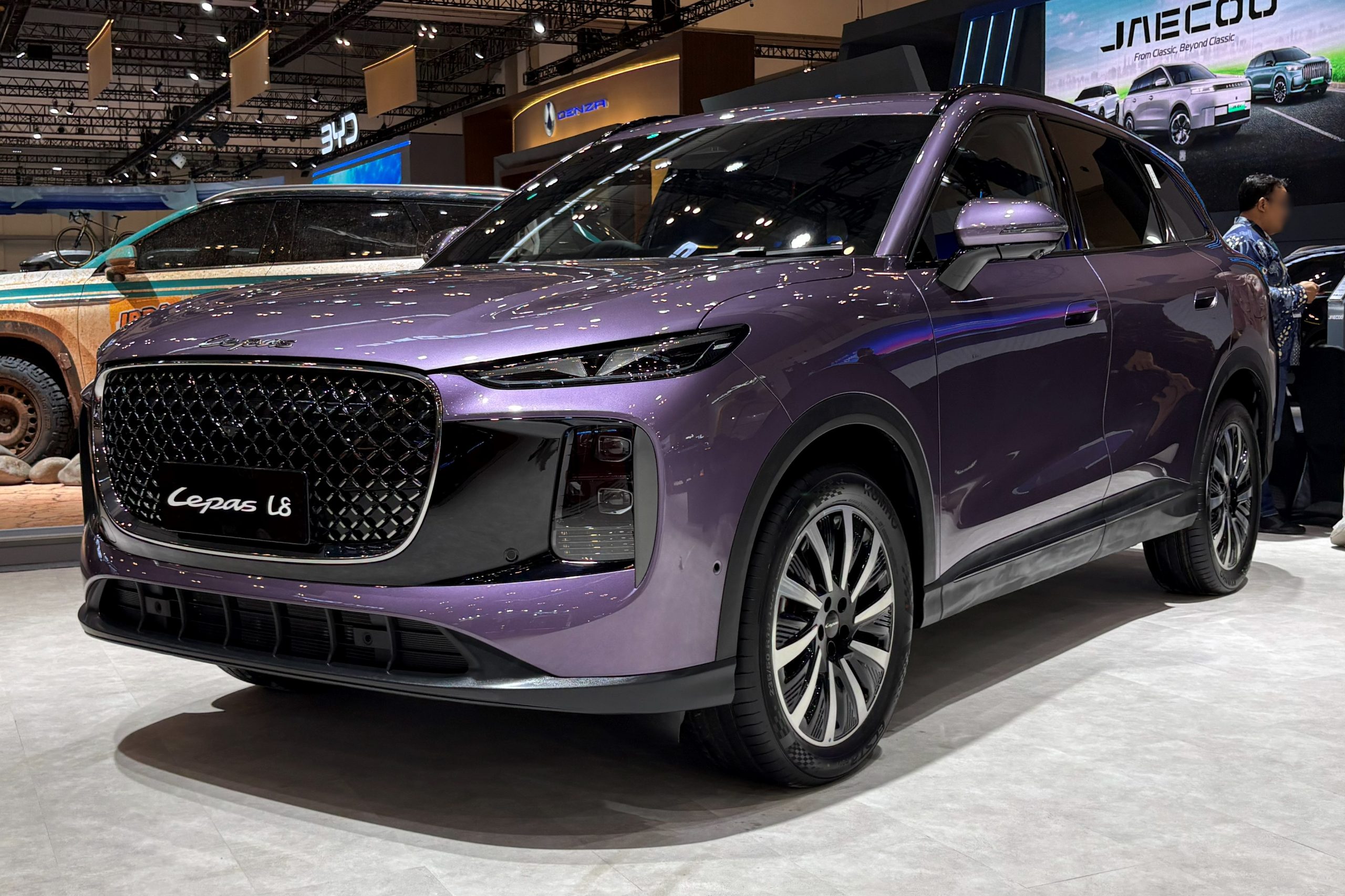 Lepas L8 PHEV shown at a regional launch event, sharing its platform and powertrain with UK-spec cars