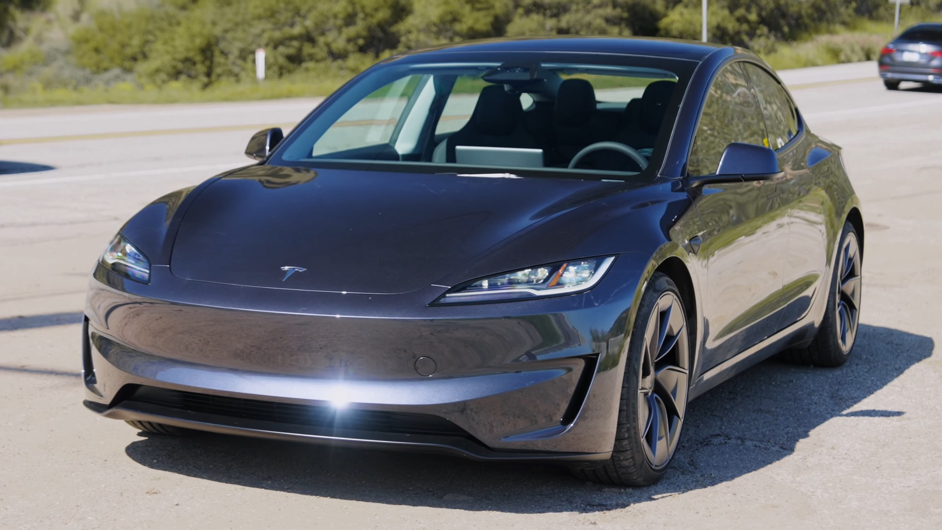Grey 2024 Tesla Model 3 Performance electric sedan, front three-quarter view