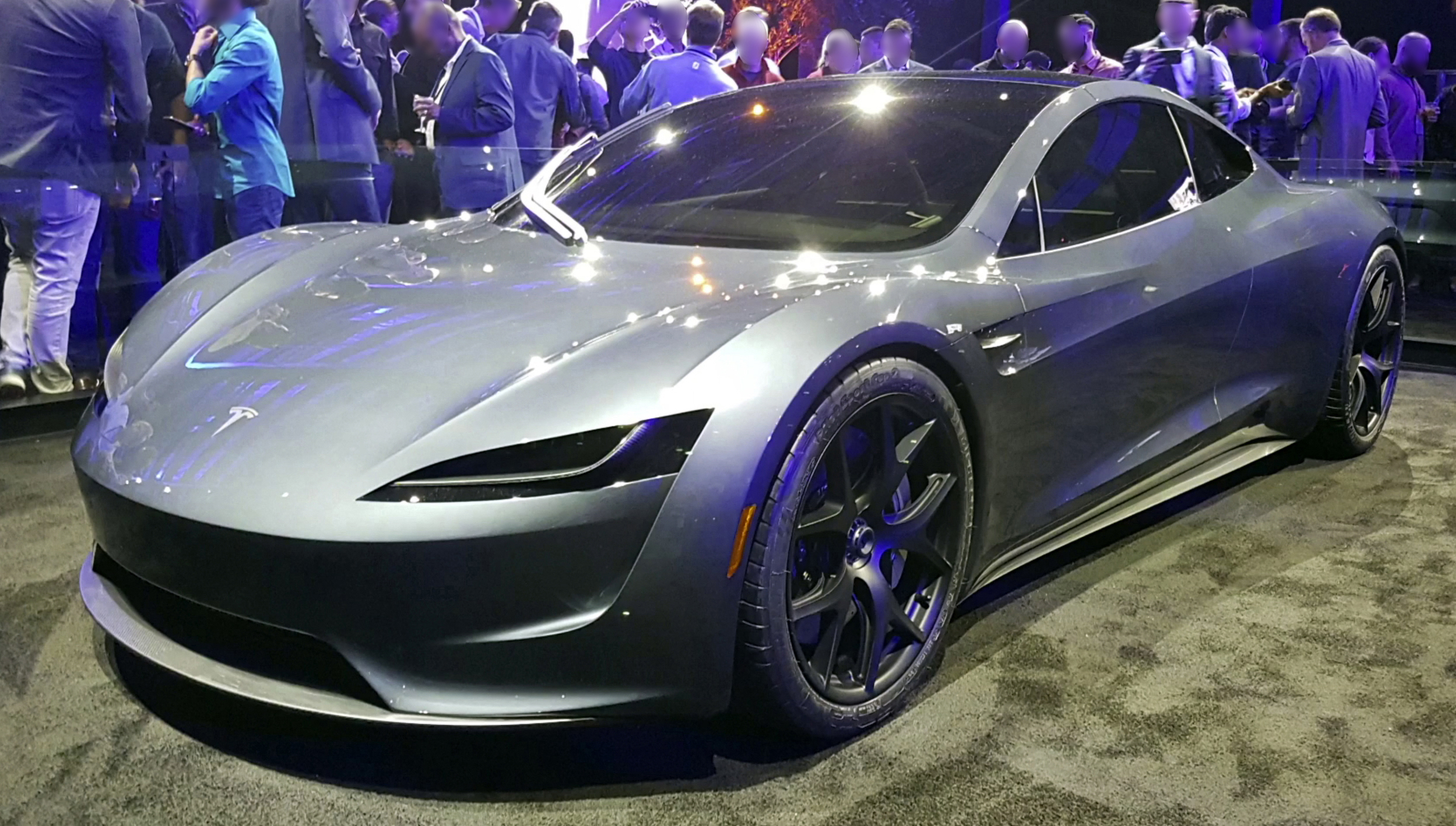 Grey second-generation Tesla Roadster prototype on stage at the November 2017 launch, front three-quarter view