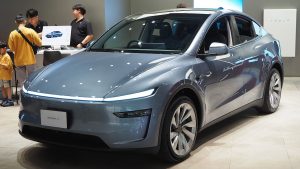 2025 Tesla Model Y Long Range all-wheel drive in a showroom