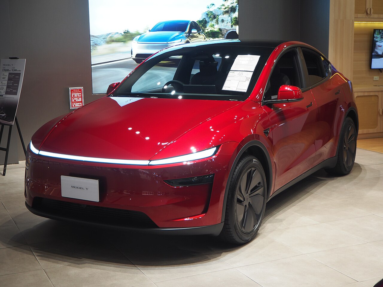 2025 Tesla Model Y Long Range rear-wheel drive, front three-quarter view